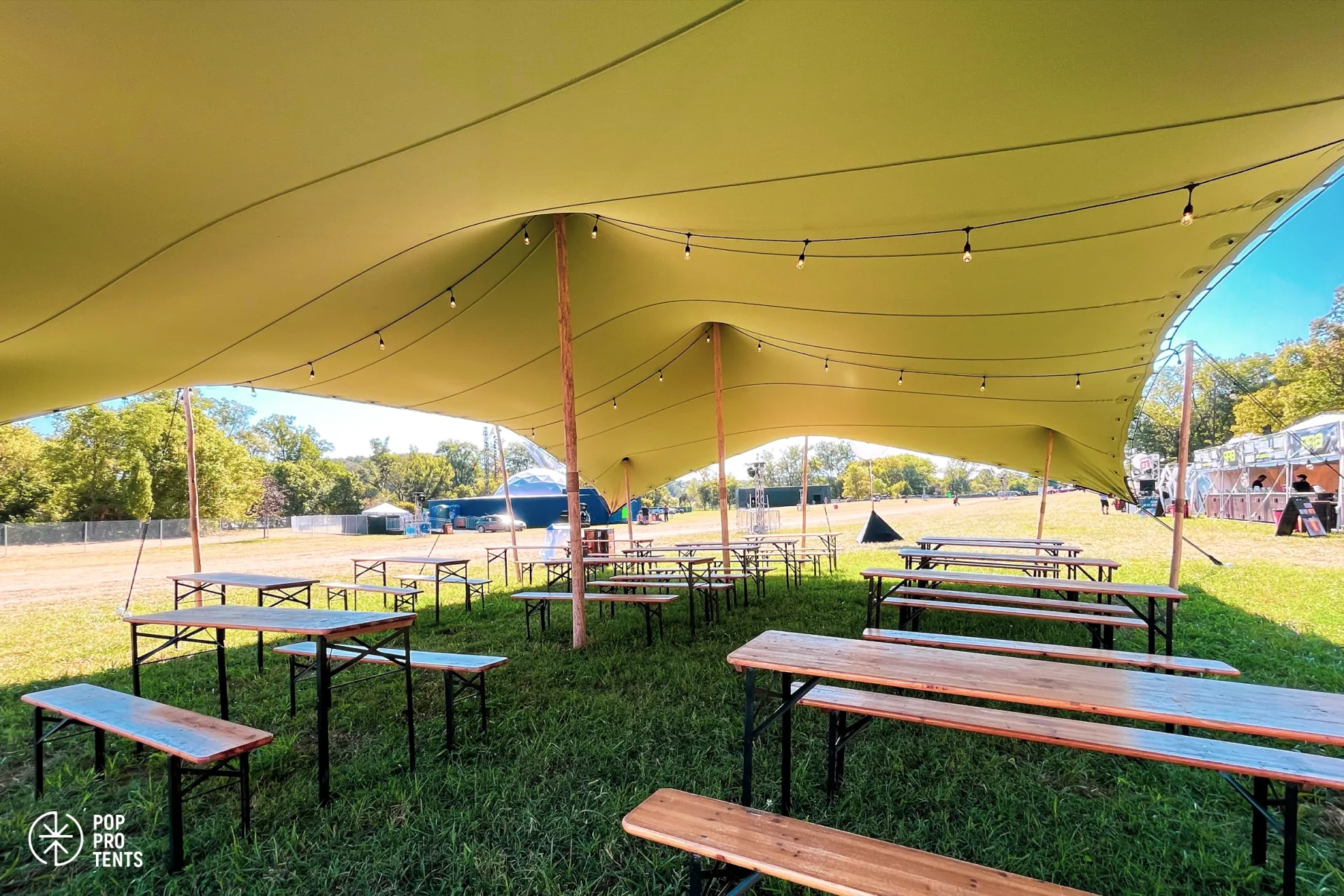 Corporate awards ceremony under stretch tent