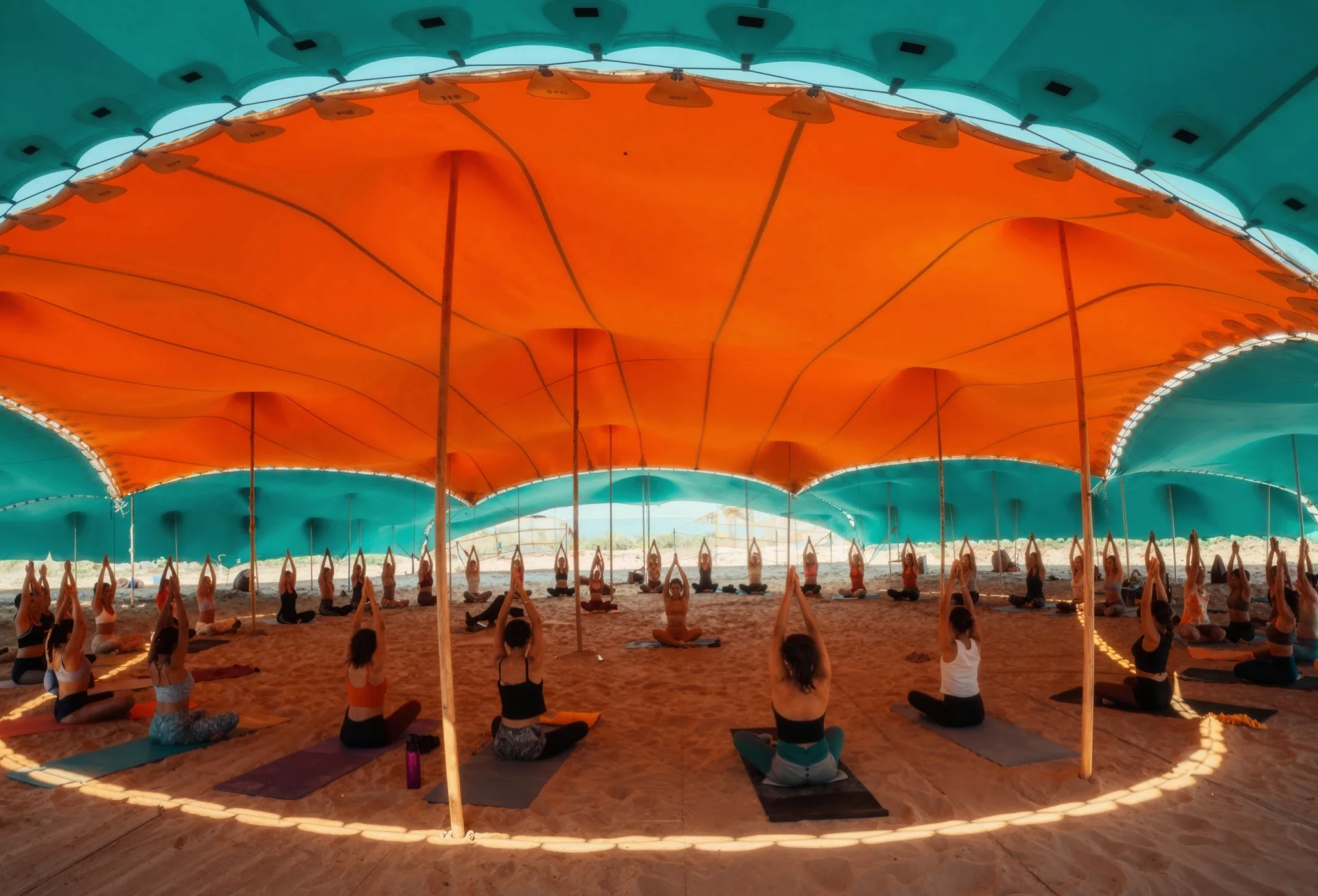 Pop Pro Tents stretch tent illuminated at a festival