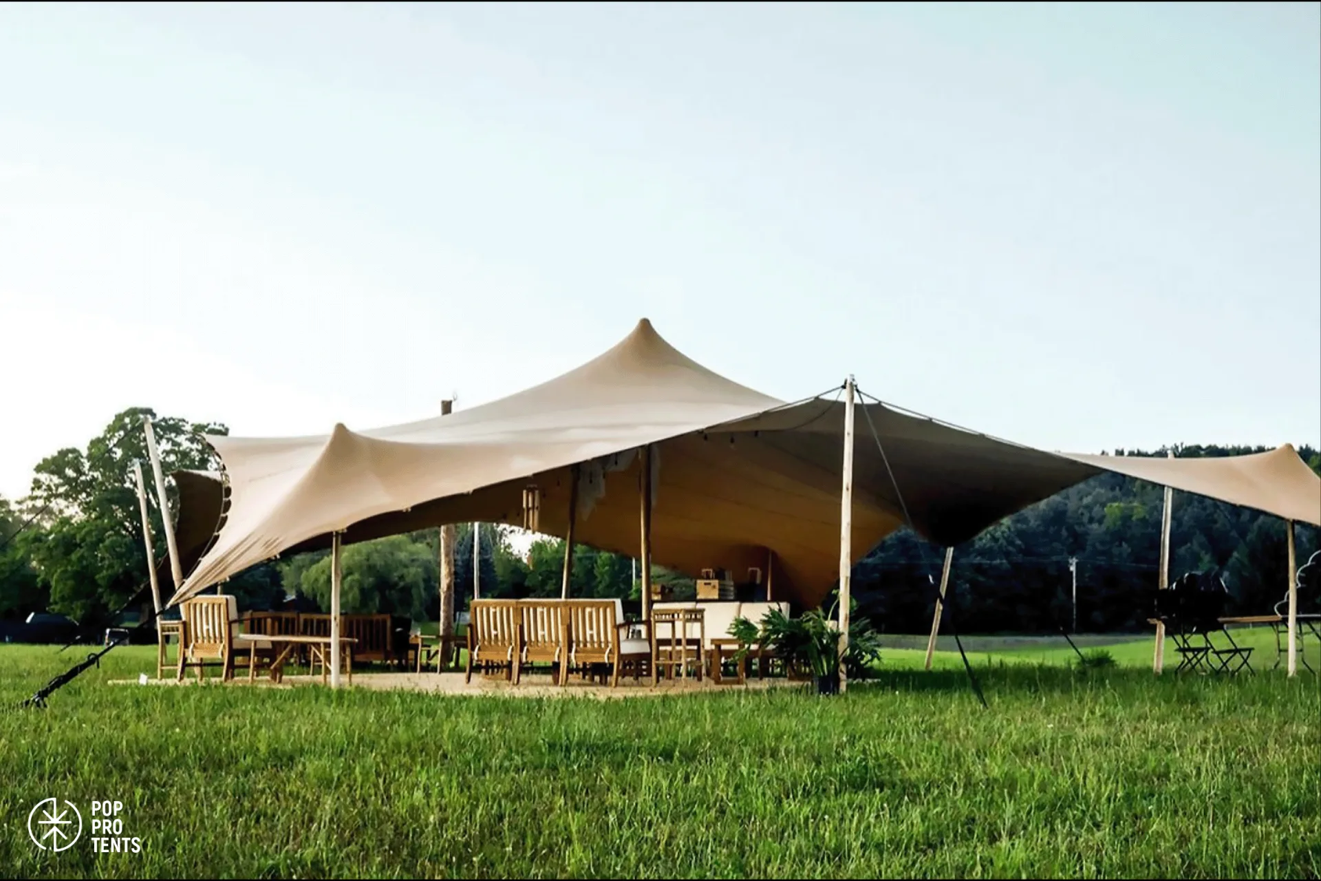 Charity gala fundraiser under stretch tent
