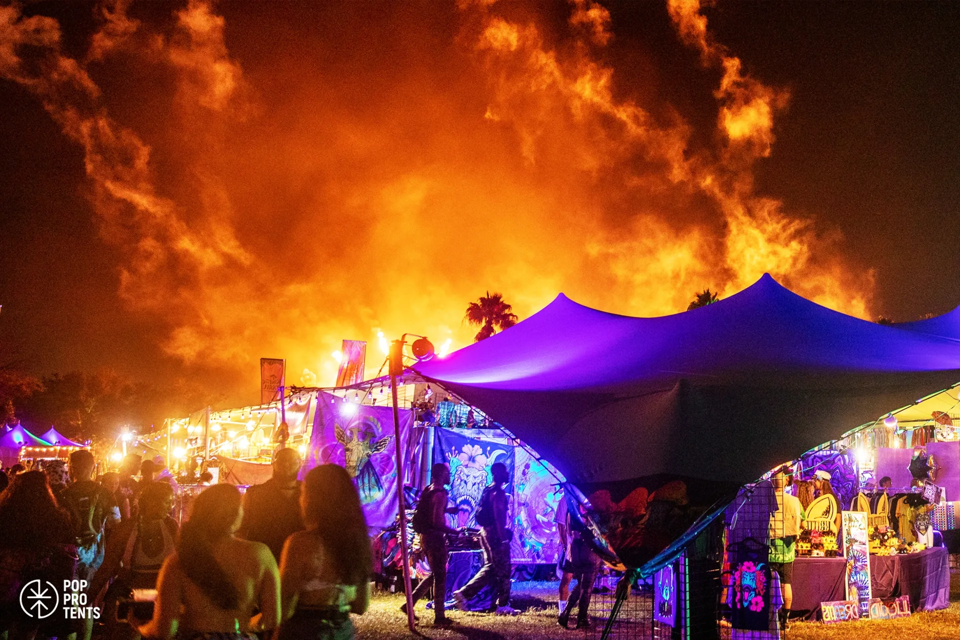 Folk music festival in woodland under stretch tent