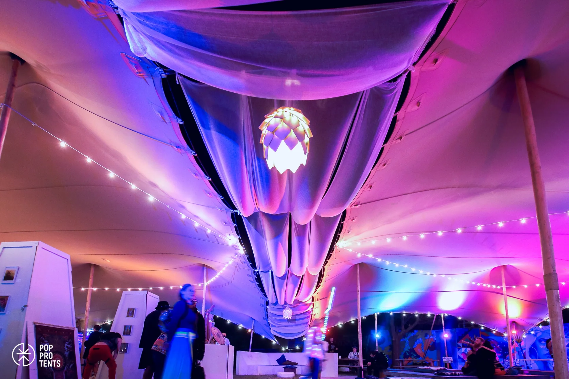 Birthday party under decorated stretch tent