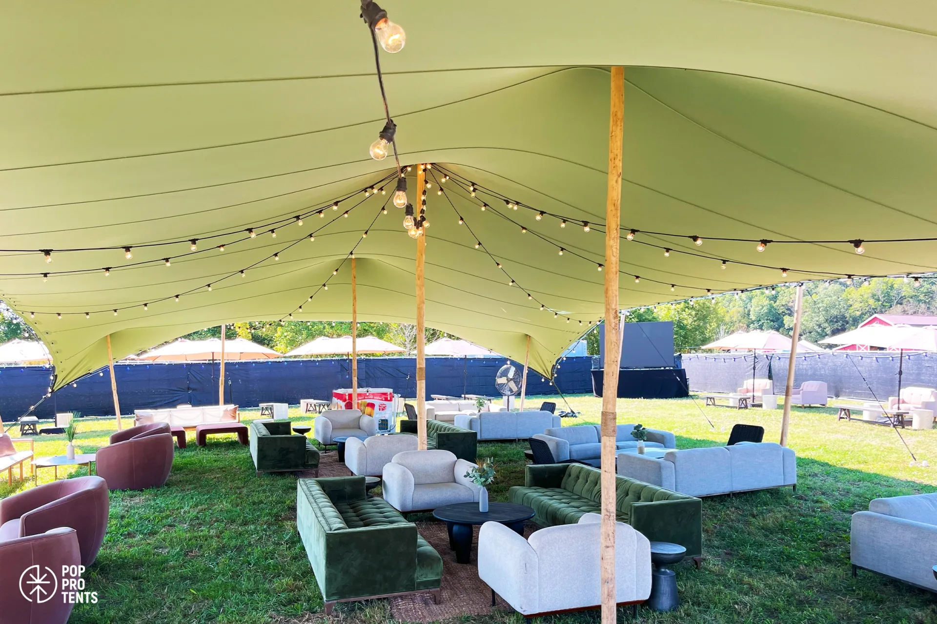 Draped fabric and chandelier bespoke tent decor