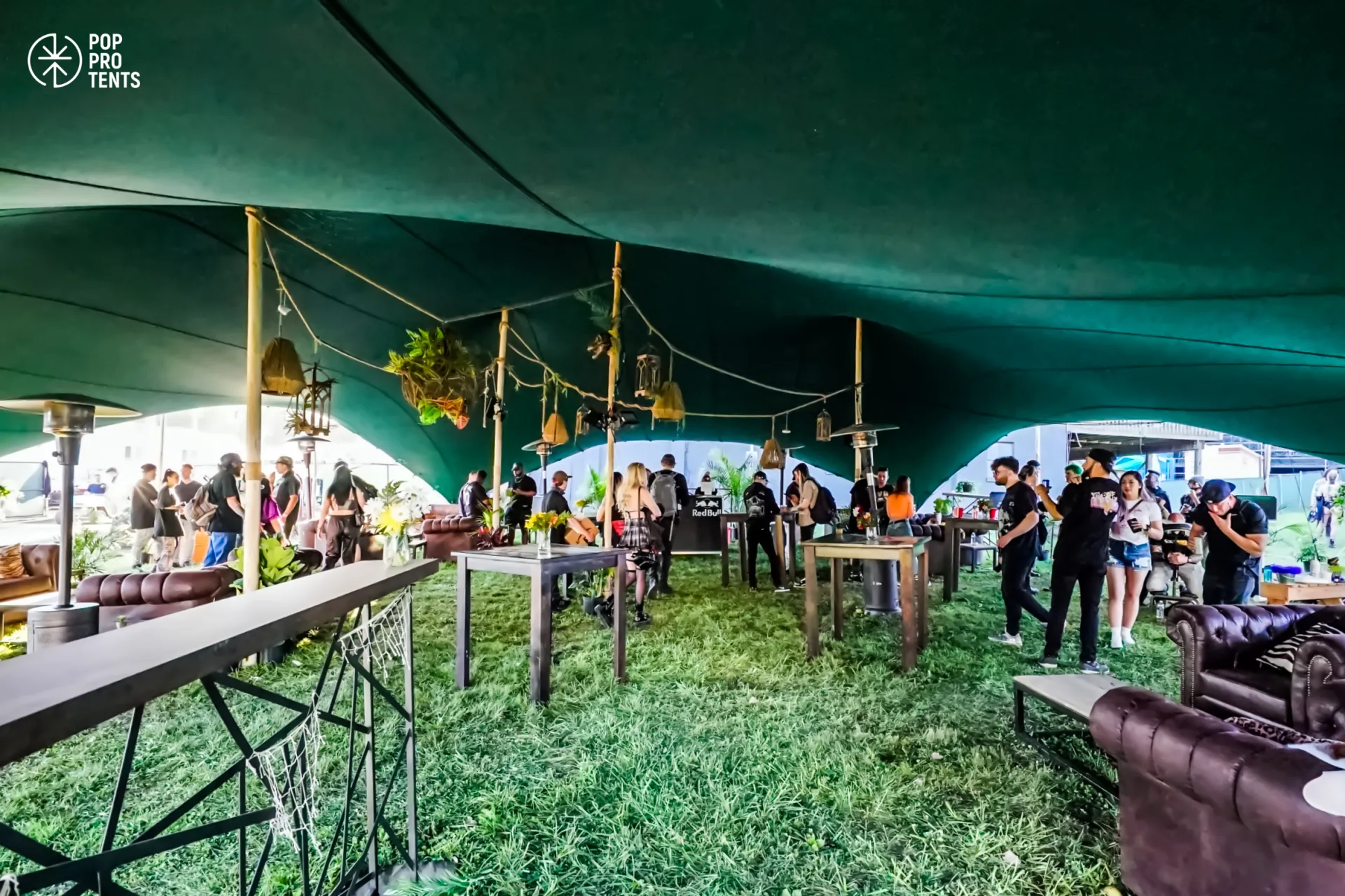Bespoke floral ceiling installation under stretch tent