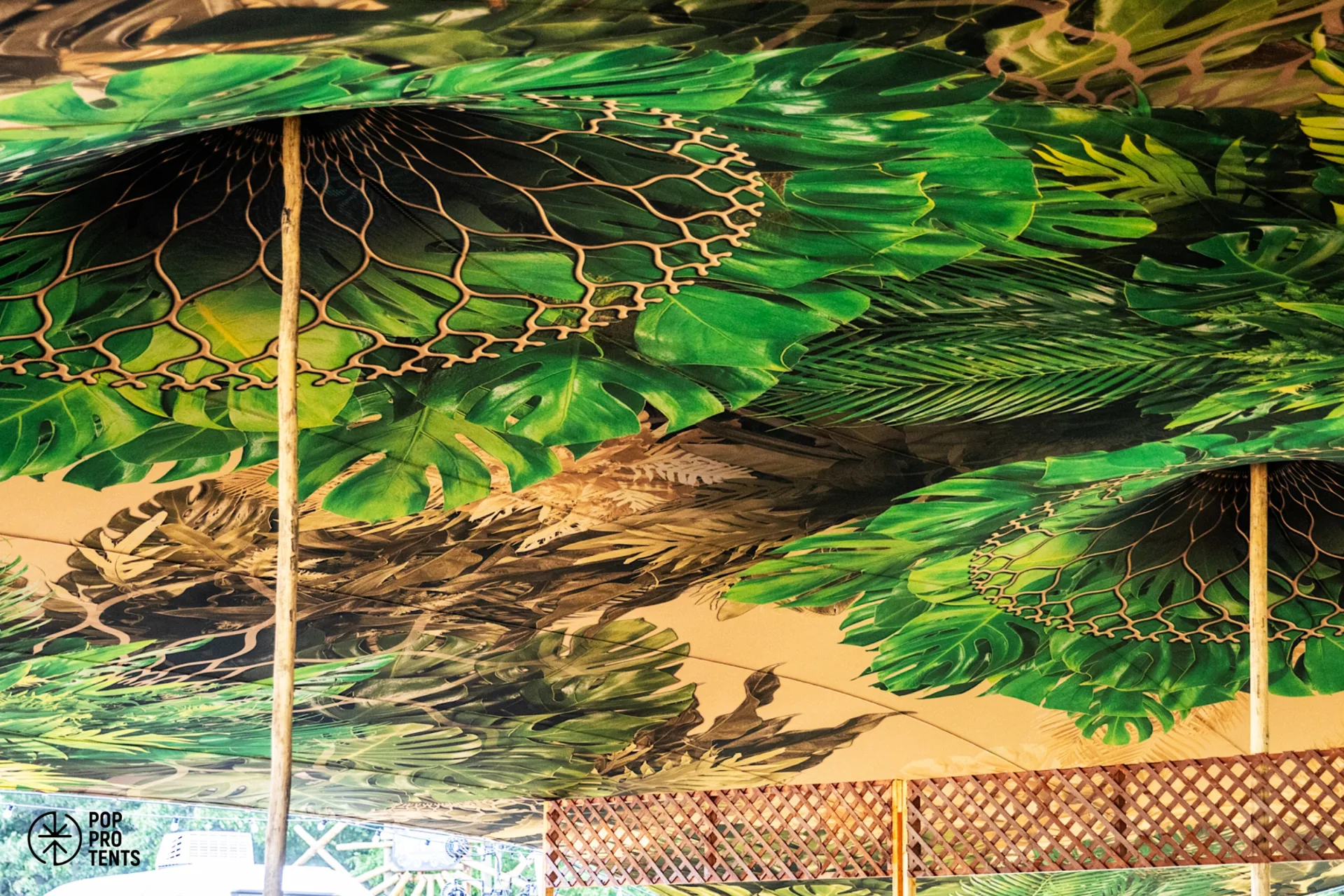 Stretch tent with a custom-printed brand logo skin
