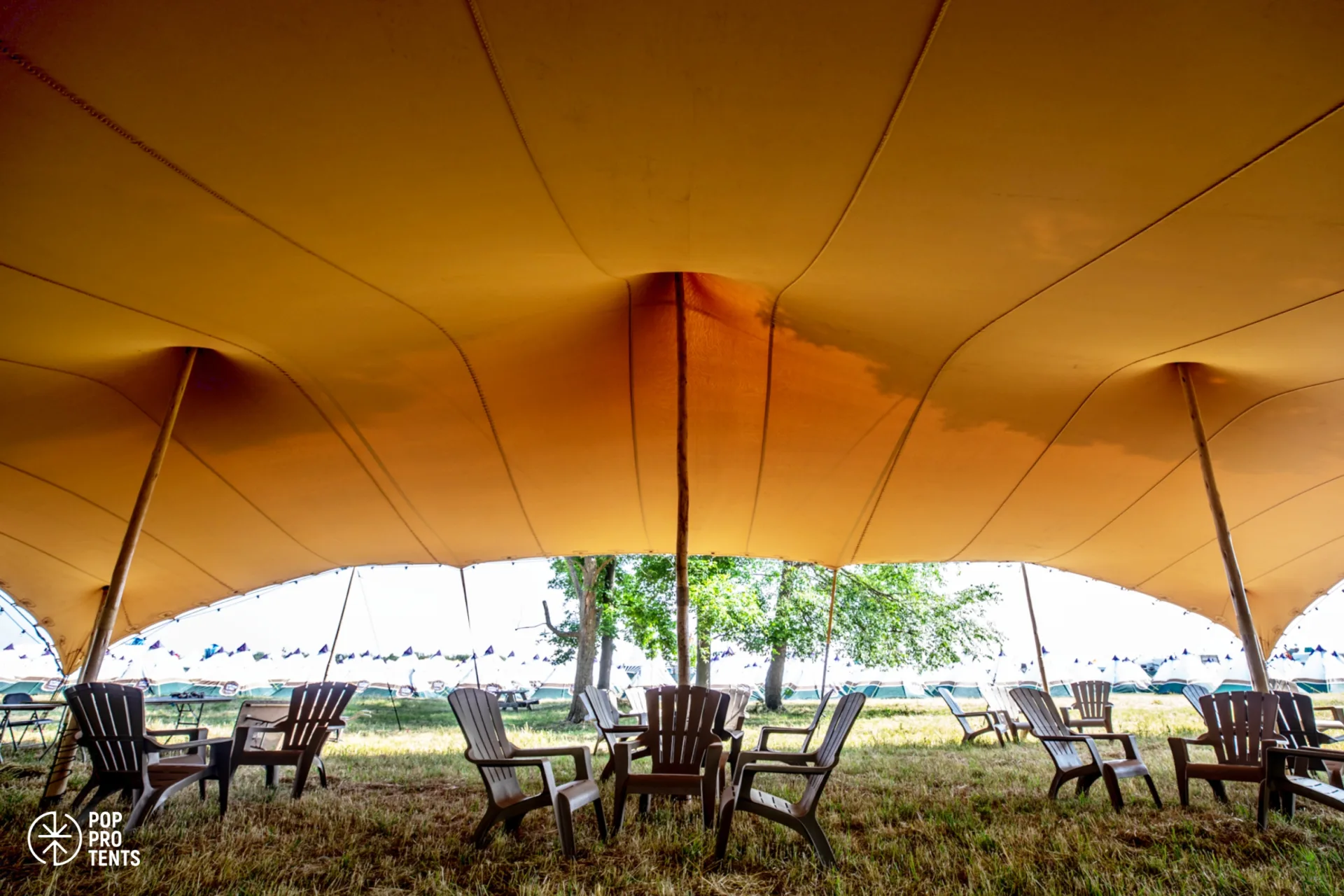 Street food market under stretch tent