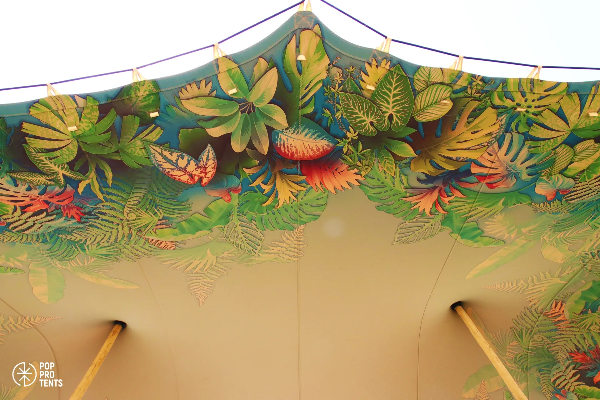 Stretch tent with a custom-printed tropical floral skin